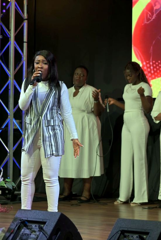 Women worshipping at a KWOW gathering